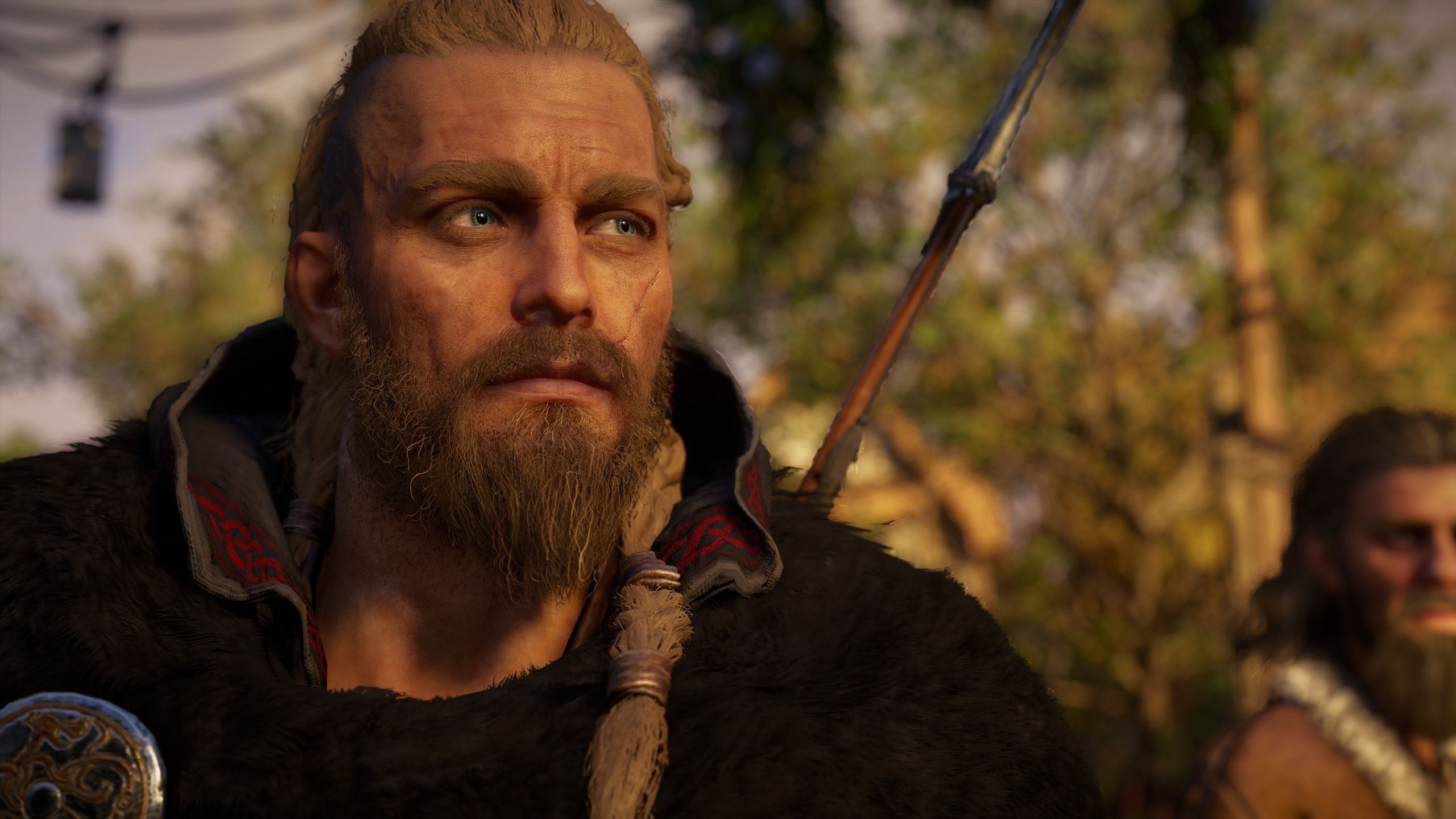Assassin's Creed Valhalla protagonist Eivor in a dramatic Viking landscape scene