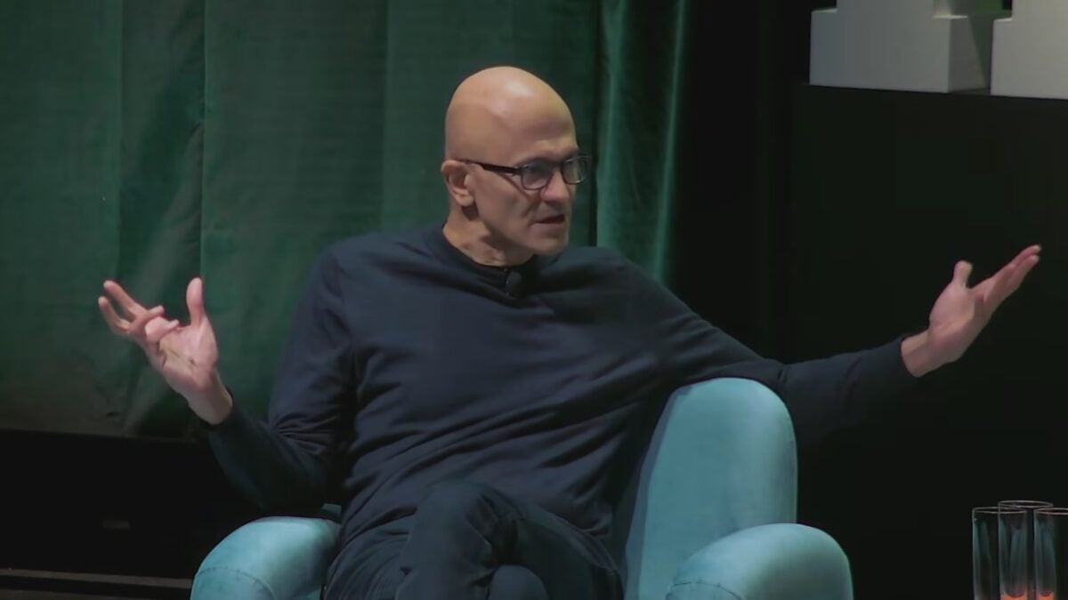 Microsoft CEO Satya Nadella speaking on stage about Xbox gaming business strategy