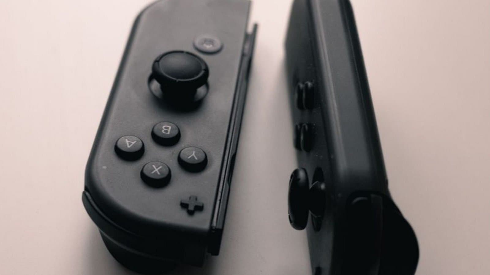 Nintendo Switch Joy-Con controllers detached from the console on a flat surface