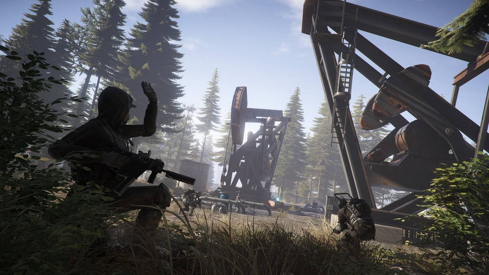 Ghost Recon franchise tactical military shooter gameplay with armed soldiers in dark environment