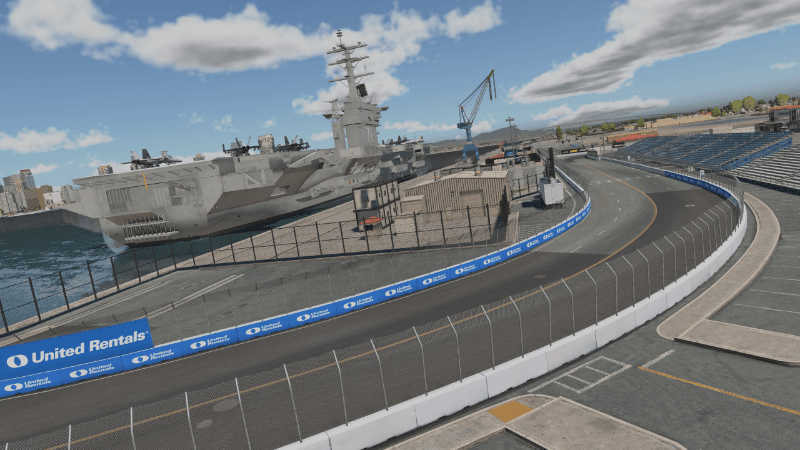 iRacing pit lane with race control interface overlay, 2026 Season 3
