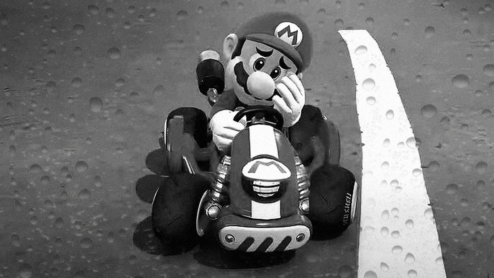 Mario Kart Tour mobile game characters racing on a colourful track