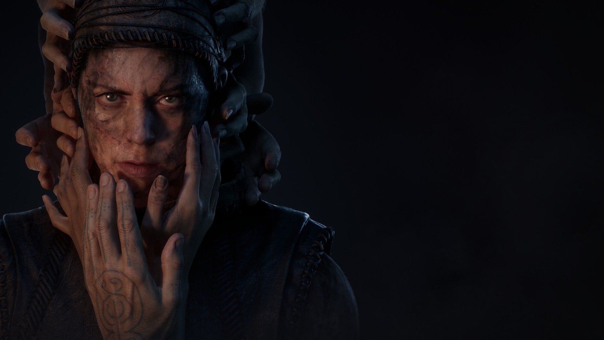 Senua stands in a dark purgatory landscape in Hellblade 3 Senua key art