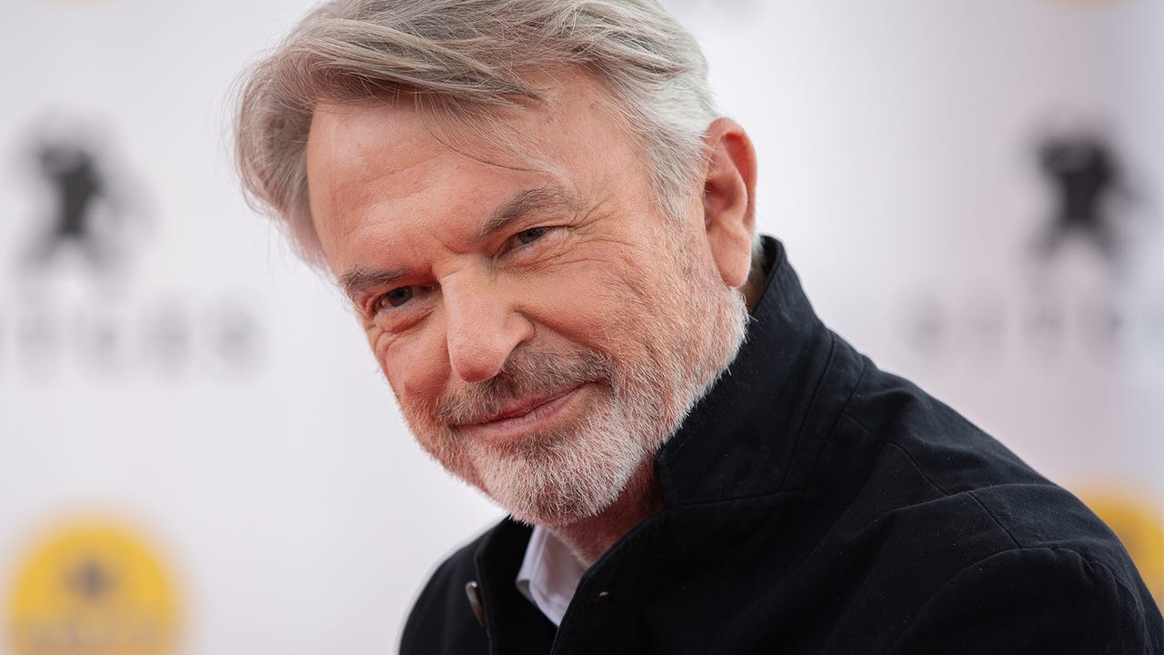 Sam Neill in a promotional image alongside The Legend of Zelda movie branding