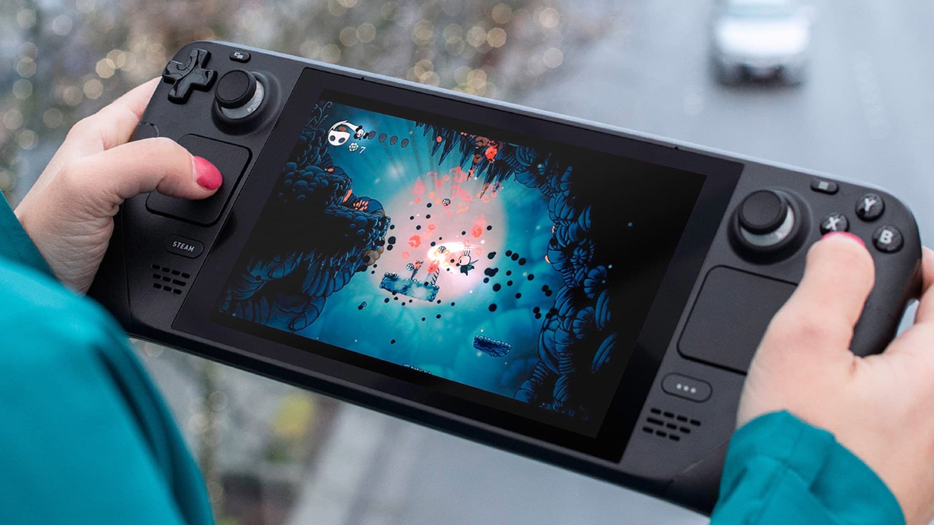 Steam Deck handheld device displaying a PlayStation game streaming interface