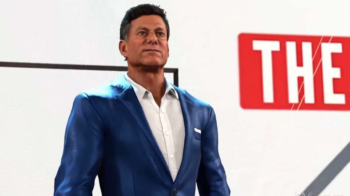 WWE 2K26 gameplay showing a wrestler entrance in a packed arena