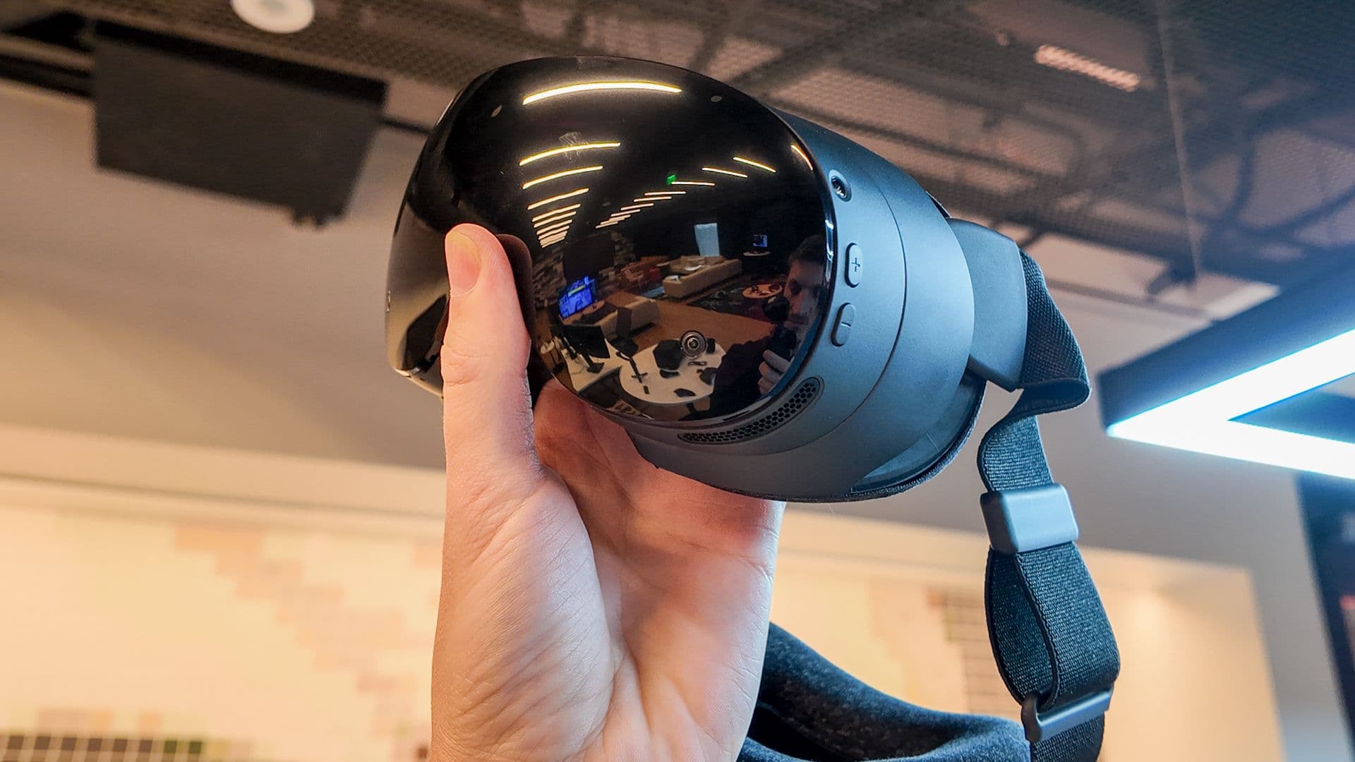 Valve Steam Frame wireless VR headset shown from a front angle on a dark background