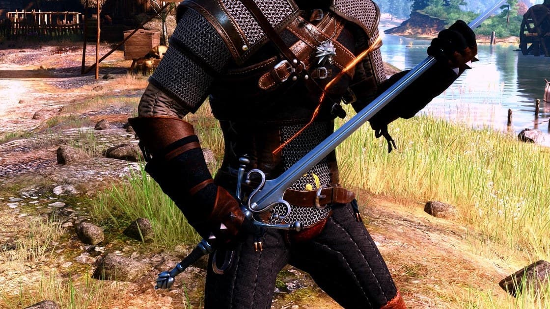 Geralt holding an ornate sword in The Witcher 3 Songs of the Past promotional artwork